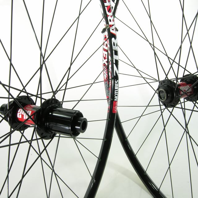 Custom wheel: DT 240 Centerlock Black hubs, Stan's Arch EX Black rims, DT Competition Black spokes