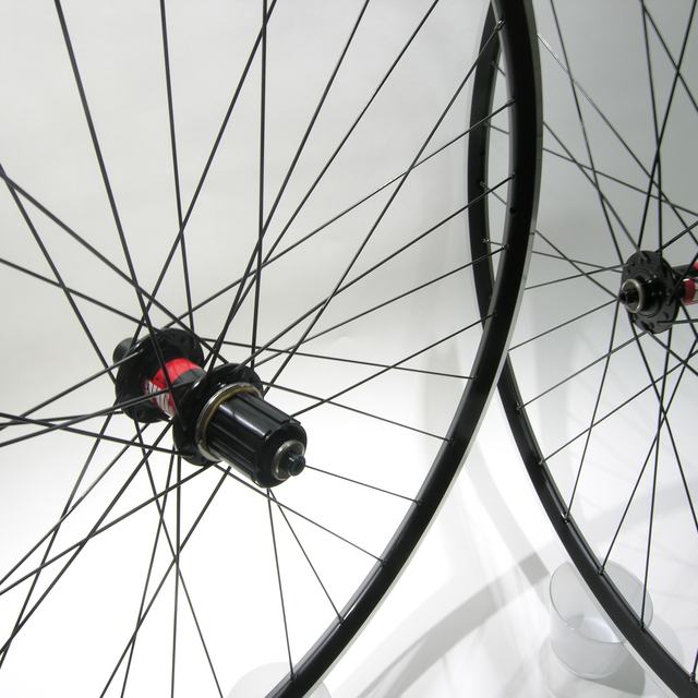 Custom wheel: DT 240 Black hubs, Velocity A23 MSW Black rims, DT Competition Black spokes