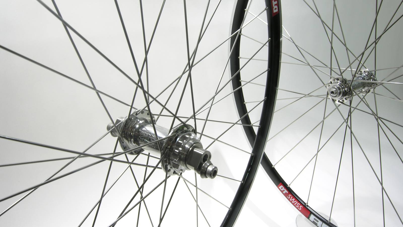 Custom wheel built by ProWheelBuilder: White Industries ENO Ecc MI5 Polished hubs, DT Rr585 Black rims