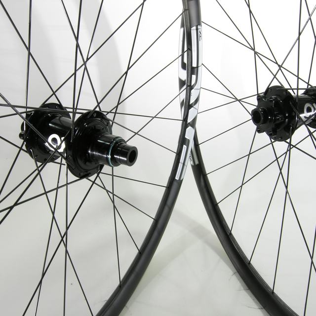 Custom wheel: Industry Nine Torch MTB Black hubs, ENVE XC Black rims, Sapim Race Black spokes