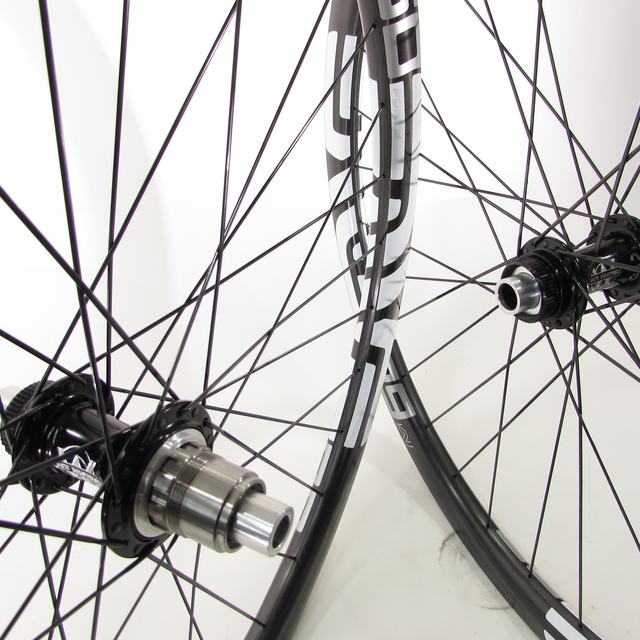 Custom wheel: White Industries CLD Black hubs, ENVE 60 Forty Black rims, Sapim CX-Ray Black spokes