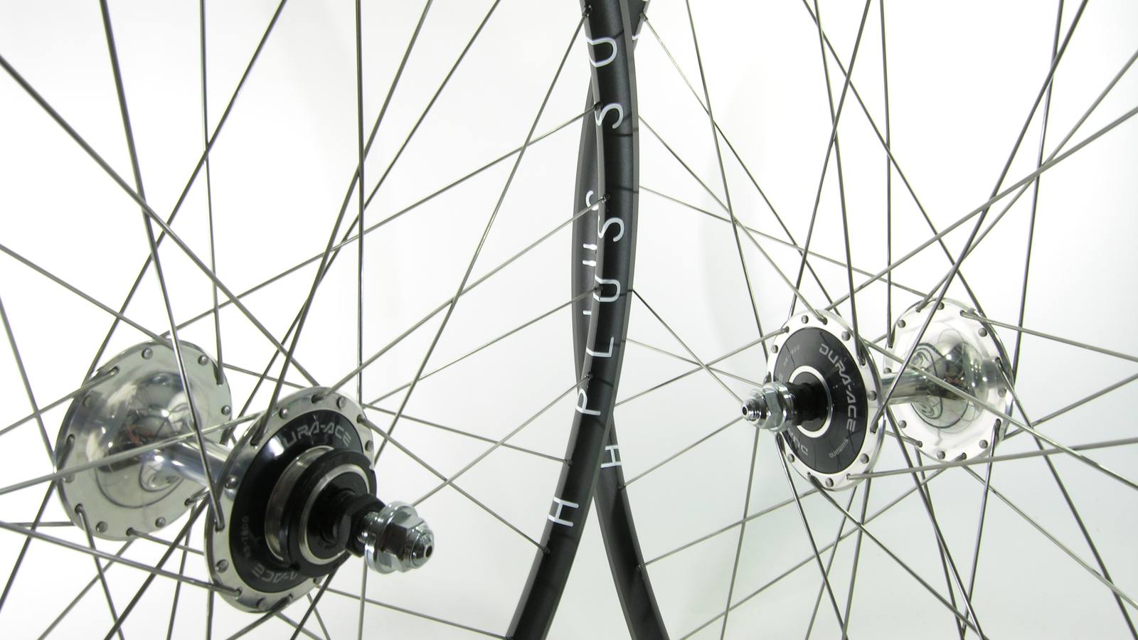 Custom wheel built by ProWheelBuilder: Shimano Durrace High Flange Track Silver hubs, H Plus Son Archetype Black rims