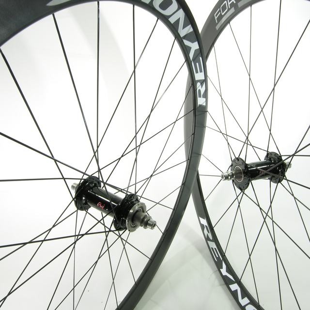 Custom wheel: Phil Wood Track Low Flange Black hubs, Reynolds 46 Black rims, Sapim CX-Ray Black spokes