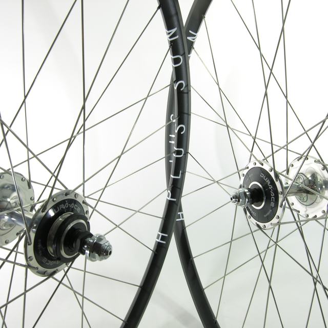 Custom wheel: Shimano Durrace High Flange Track Silver hubs, H Plus Son Archetype Black rims, Sapim Leader Silver spokes