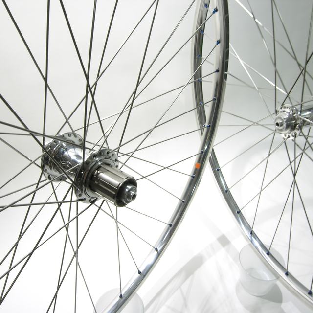 Custom wheel: White Industries MI5 Polished hubs, Velo Orange Polished rims, DT Champion Silver spokes