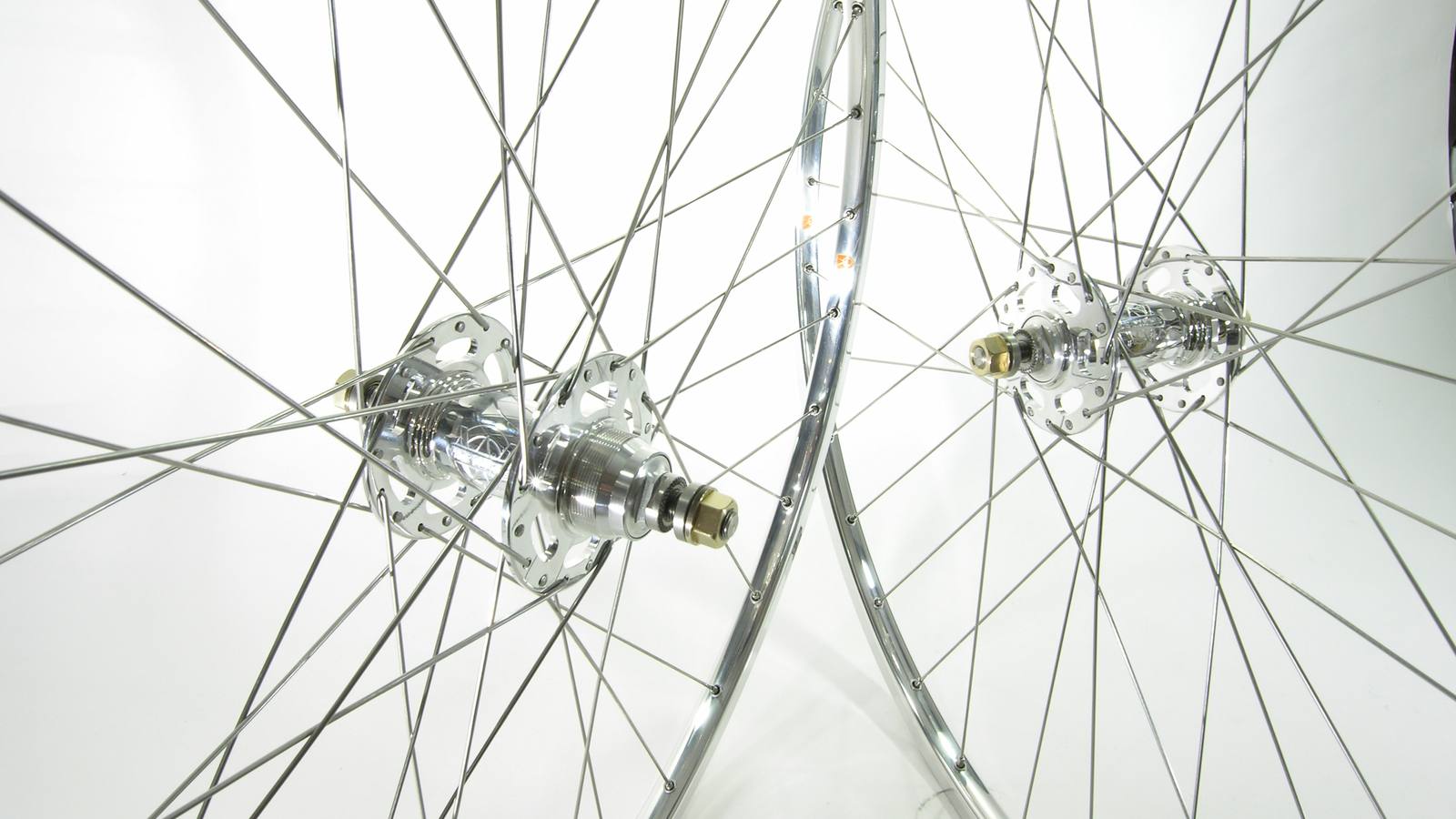 Custom wheel built by ProWheelBuilder: White Industries Track Polished hubs, Velo Orange Polished rims