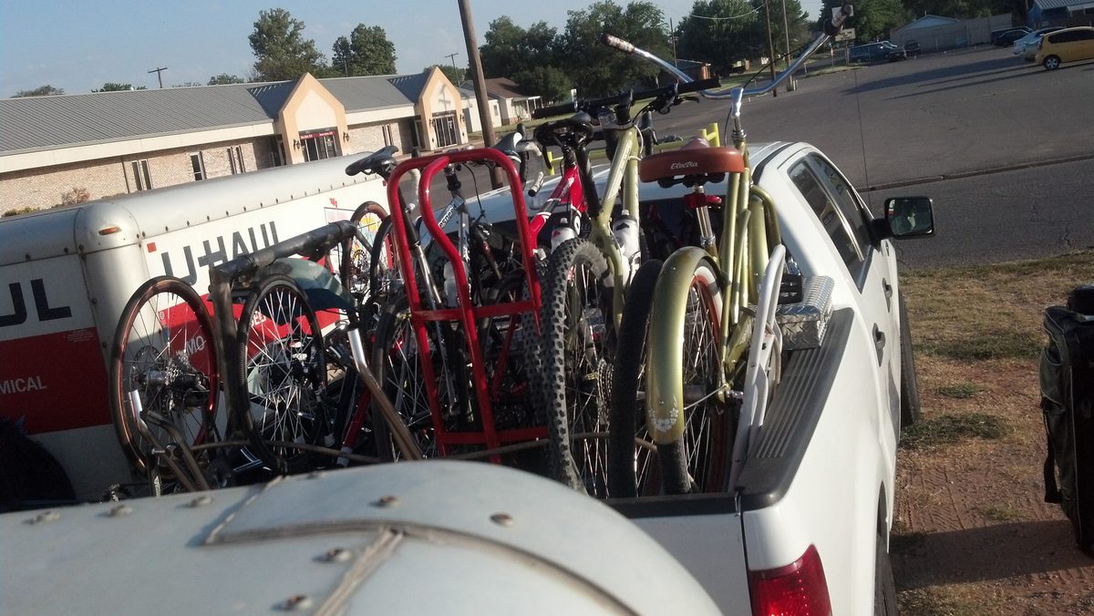 Bikes loaded in the pickup bed for the cross-country move